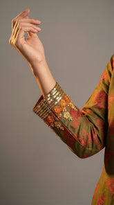  Close-up of hand embroidered Adda work on olive green crepe silk

