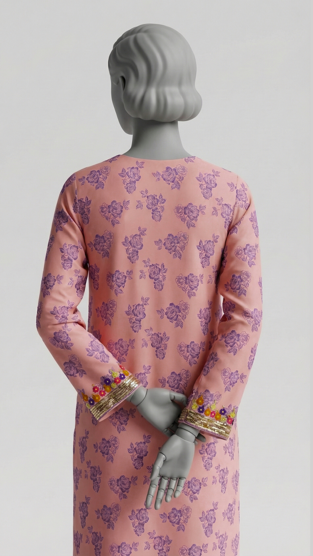 Peach and orange hand embroidered crepe silk suit with Adda work