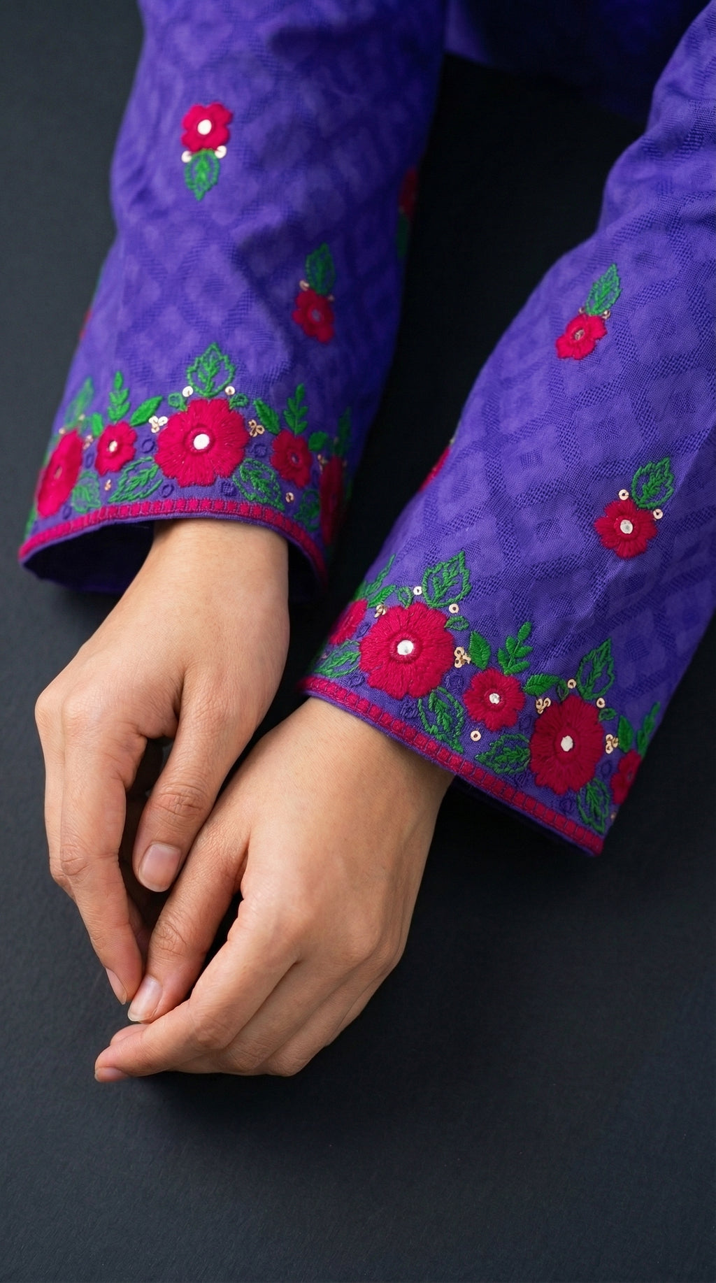 Hand embroidered sleeves and hem detail on royal blue suit

